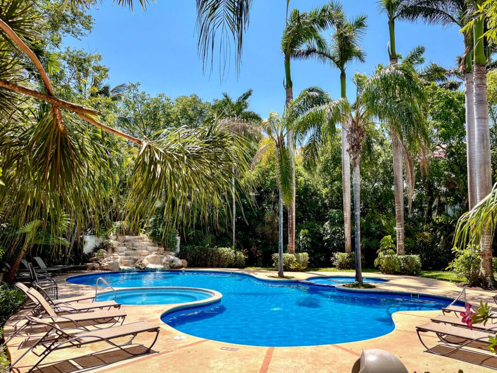 view of pool and gardens